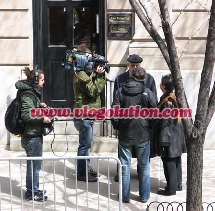 Camera crew filming in front of Bernie Madoff's former Manhattan residence.